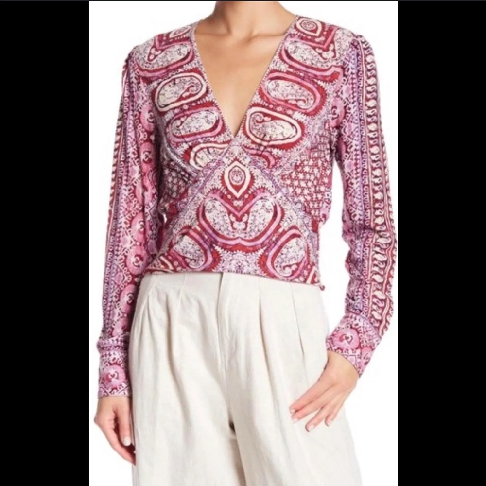 FREE PEOPLE slightly cropped long sleeve blouse!